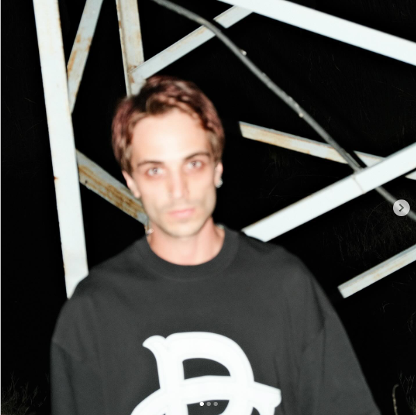 BARIS BERBER portrait in a dark industrial setting